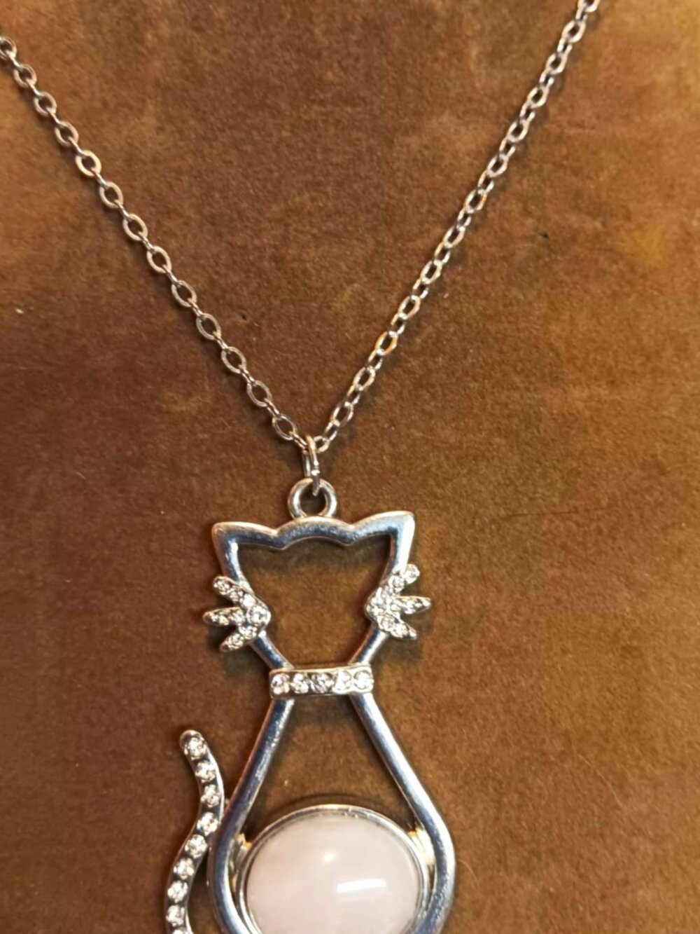 Necklace, pendant, cat, rose quartz body, rhinestone details. 34"with 2" x 1.25"
